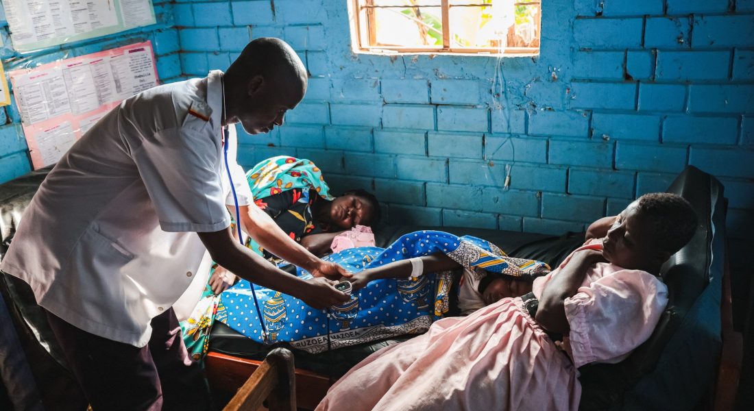 Peter Treating Patient in clinic